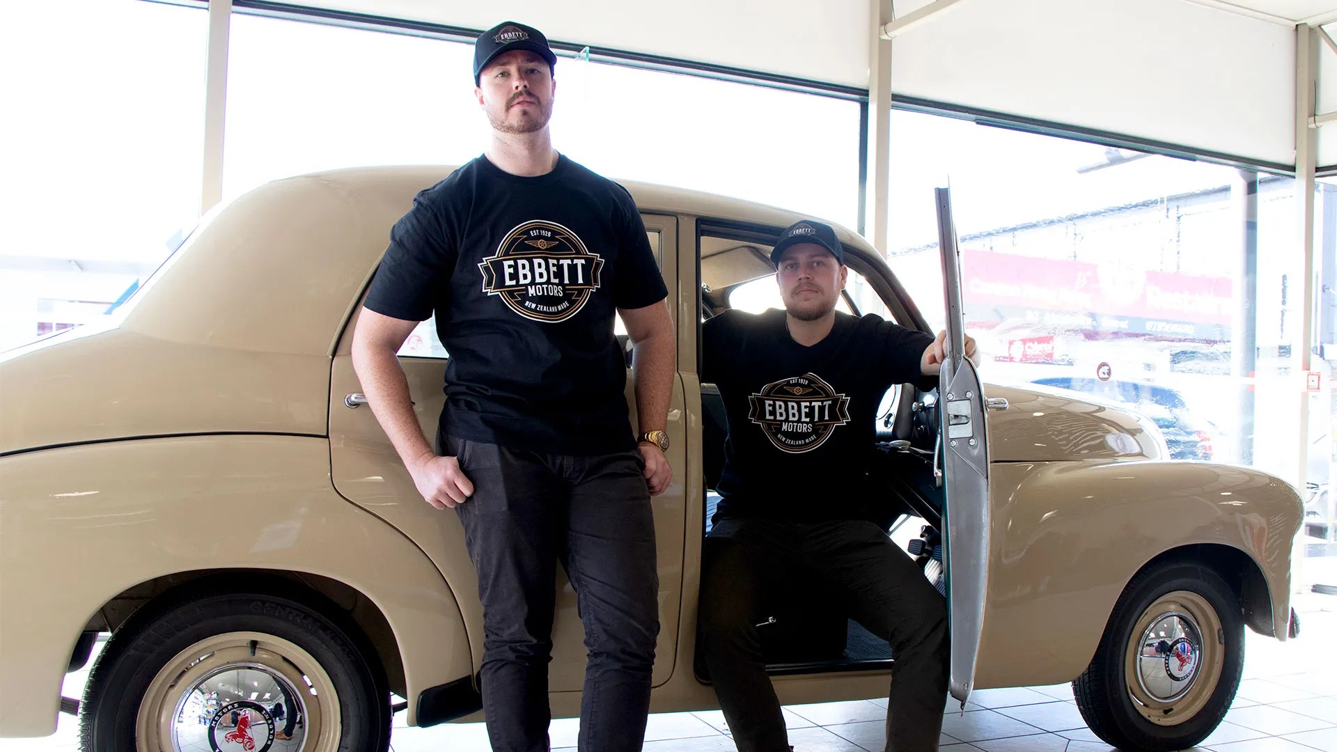 Ebbett Vintage Merch - two guys in front of vintage car